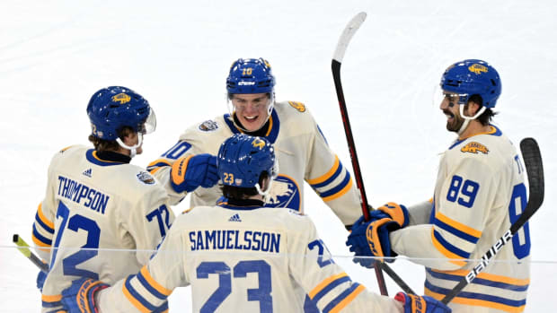 Mar 13, 2022; Hamilton, Ontario, Canada; Buffalo Sabres forward Tage Thompson (72) celebrates with team mates after scoring against the Toronto Maple Leafs in the 2022 Heritage Classic ice hockey game at Tim Hortons Field. Mandatory Credit: Dan Hamilton-USA TODAY Sports